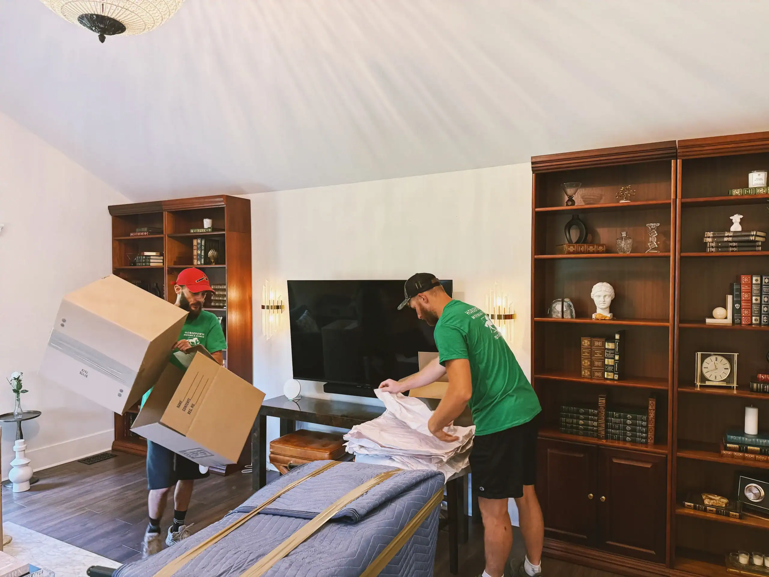 Horsepower Moving crew packing household belongings in Louisville, KY