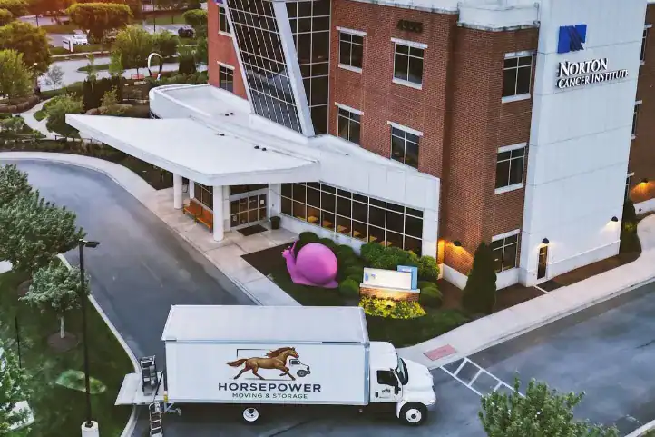 Horsepower Moving and Storage truck outside Norton Cancer Institute in Louisville, KY